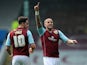 Michael Kightly of Burnley celebrates scoring their second goal during the Sky Bet Championship match between Burnley and Wigan Athletic at Turf Moor on April 21, 2014