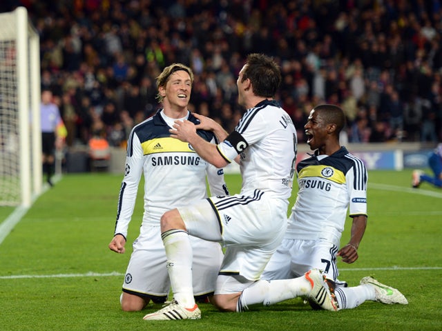 Chelsea's Spanish forward Fernando Torres celebrates with teammates midfielder Frank Lampard and Brazilian midfielder Ramires after scoring during the UEFA Champions League second leg semi-final football match Barcelona against Chelsea at the Cam Nou stad