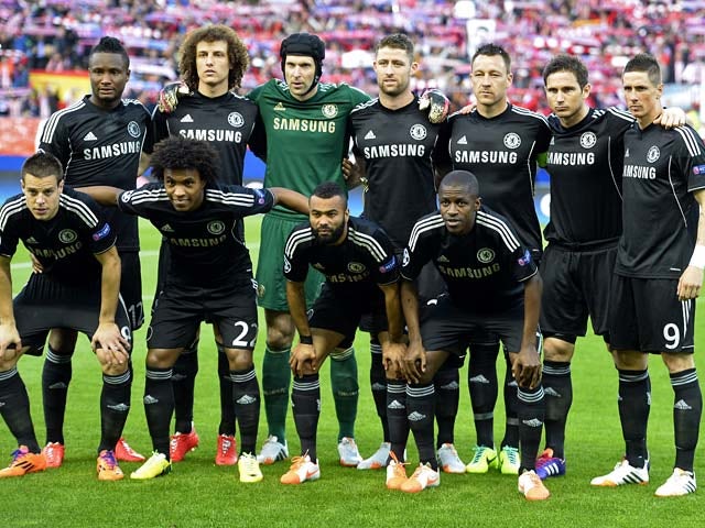 Chelsea's starting eleven pose for a photo moments before kick-off against Atletico Madrid during the Champions League semi-final first leg match on April 22, 2014