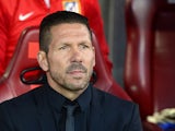 Atletico Madrid's coach Diego Simeone looks on prior to kick-off in the Champions League semi-final first leg match against Chelsea on April 22, 2014