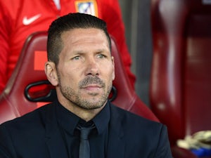 Atletico Madrid's coach Diego Simeone looks on prior to kick-off in the Champions League semi-final first leg match against Chelsea on April 22, 2014