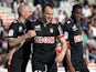 Monaco's Dimitar Berbatov celebrates with teammates after scoring the opening goal against Ajaccio during the Ligue 1 match on April 26, 2014