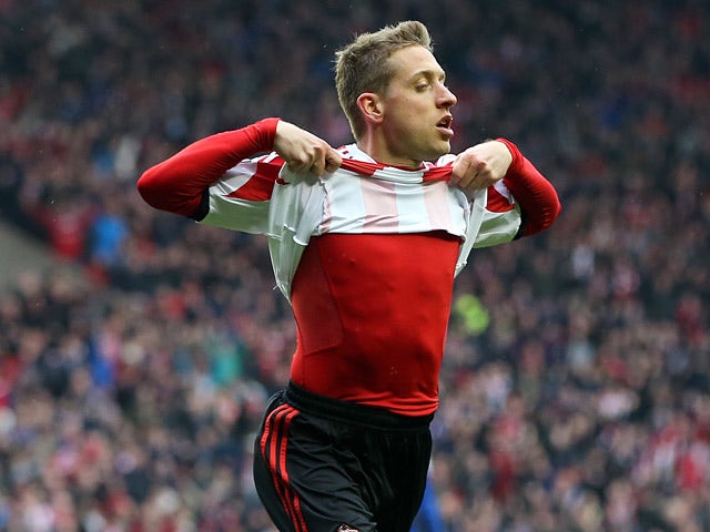 Sunderland's Emanuele Giaccherini celebrates after scoring his team's third goal against Cardiff during the Premier League match on April 27, 2014
