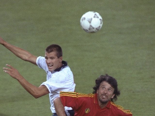 Belgium's Eric Gerets challenges England's Steve Bull for possession on June 26, 1990.
