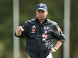 Sydney FC coach Frank Farina speaks to players during a Sydney FC A-League training session at Macquarie Uni on April 15, 2014
