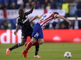 Chelsea's Ramires and Atletico's Gabi battle for the ball during the Champions League semi-final first leg match on April 22, 2014