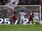 Roma's Gervinho scores his team's second goal against AC Milan during the Serie A match on April 25, 2014