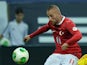 Turkey's Gokhan Tore in action against Romania during the World Cup 2014 qualifying match on September 10, 2013
