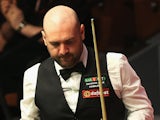 Jamie Burnett looks on after losing to Joe Perry during The Dafabet World Snooker Championship on April 21, 2014