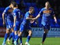 Shrewsbury's Jon Taylor celebrates with teammates after scoring his team's first goal against Peterborough during the League One match on April 26, 2014