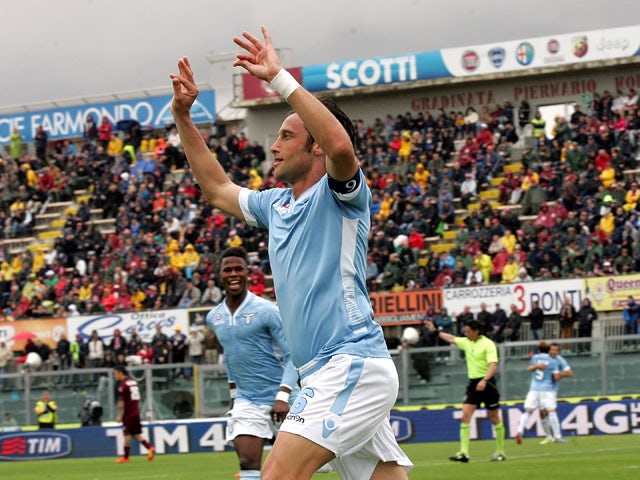 Stefano Mauri of SS Lazio celebrates after scoring a goal during the Serie A match between AS Livorno Calcio and SS Lazio at Stadio Armando Picchi on April 27, 2014