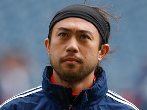 Lee Nguyen #24 of the New England Revolution looks on prior to the match against the Seattle Sounders FC at CenturyLink Field on April 13, 2013