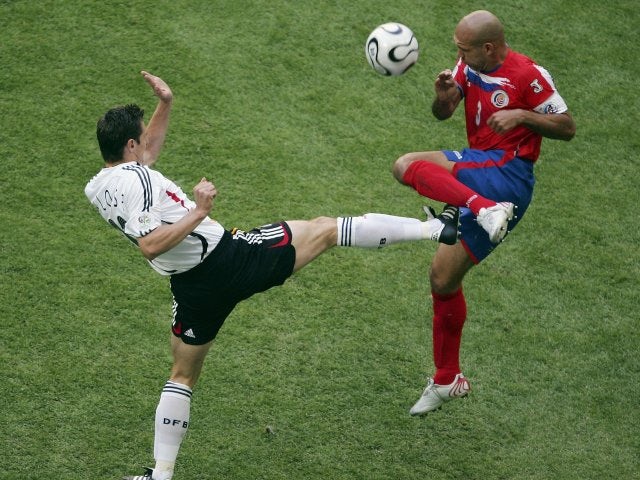Costa Rica captain Luis Martin battles for possession with Germany striker Miroslav Klose on June 09, 2006.