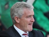 Stoke manager Mark Hughes watches his team against Tottenham during the Premier League match on April 26, 2014 