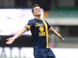 Hellas Verona's Marquinho celebrates after scoring his team's third goal against Calcio Catania during the Serie A match on April 27, 2014
