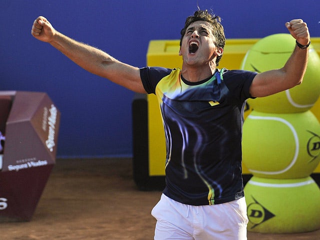 Nicolas Almagro celebrates victory over Rafa Nadal during the Barcelona Open Quarter-Finals on April 25, 2014