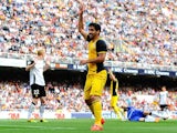 Raul Garcia of Club Atletico de Madrid celebrates after scoring the opening goal during the La Liga match against Valencia on April 27, 2014