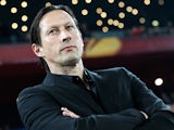 Salzburg's coach Roger Schmidt looks on during his team's UEFA Europa League round of 16 first leg football match against FC Basel on March 13, 2014