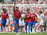 Costa Rica midfielder Roland Gomez celebrates scoring against Poland on June 20, 2006.