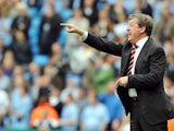 Roy Hodgson, then Fulham manager, shouts out orders to his players during their match against Manchester City on April 26, 2008.