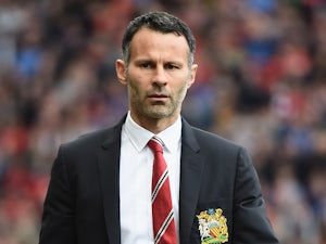 Manchester United manager Ryan Giggs walks to the dugout prior to kick-off against Norwich in the Premier League match on April 26, 2014