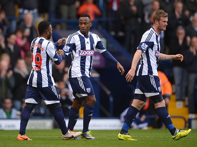 West Brom's Saido Berahino celebrates with teammates after scoring the opening goal against West Ham during the Premier League match on April 26, 2014