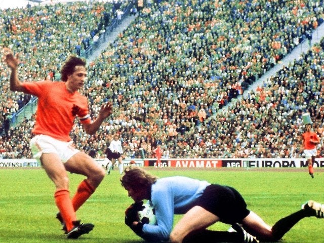 Germany goalkeeper Sepp Maier dives at the feet of Johan Cruyff on July 07, 1974.