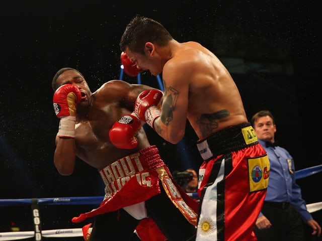 Adrien Broner and Marcos Maidana during their WBA Welterweight Title bout at Alamodome on December14, 2013