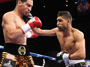 Khan tells Scottish boxers: 'Wait for Rio'