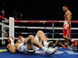 WBA super lightweight champion Amir Khan of England (R) looks at Marcos Maidana of Argentina on December 11, 201