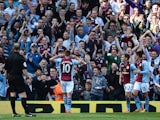 Andreas Weimann of Aston Villa celebrates his goal with Aston Villa fans during the Barclays Premier League match between Aston Villa and Hull City at Villa Park on May 3, 2014 
