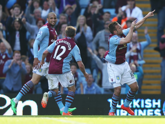 Andreas Weimann of Aston Villa celebrates his second goal during the Barclays Premier League match between Aston Villa and Hull City at Villa Park on May 3, 2014