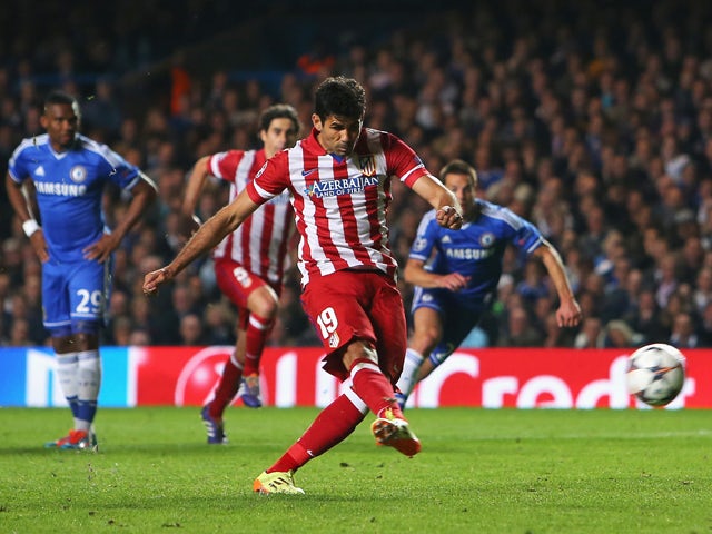 Diego Costa of Club Atletico de Madrid scores from the penalty spot during the UEFA Champions League semi-final second leg match between Chelsea and Club Atletico de Madrid at Stamford Bridge on April 30, 2014