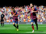 Lionel Messi of FC Barcelona celebrates after scoring the opening goal during the La Liga match between FC Barcelona and Getafe CF at Nou Camp on May 3, 2014