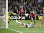 Benfica's Slovenian goalkeeper Jan Oblak and teammates eye the ball as Juventus' Argentinian foward Carlos Tevez tries to score during the UEFA Europa League semifinal football match Juventus vs Benfica on May 1st, 2014