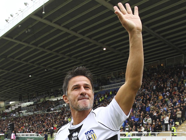 Benito Carbone of Stelle Crociate salutes the crowd before the 100 Years Anniversary match between Stelle Crociate and US Stelle Gialloblu at Stadio Ennio Tardini on October 13, 2013