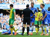 John Terry and Branislav Ivanovic of Chelsea reacts as match referee Neil Swarbrick turns down a penalty appeal during the Barclays Premier League match between Chelsea and Norwich City at Stamford Bridge on May 4, 2014