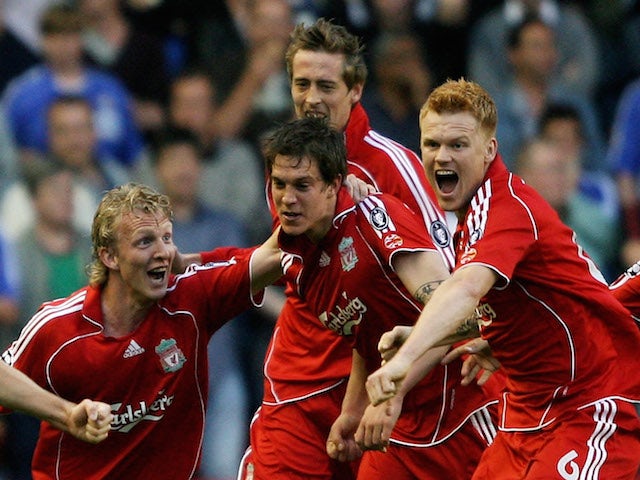 Daniel Agger of Liverpool is mobbed by team mates after scoring the first goal of the game during the UEFA Champions League semi final second leg match against Chelsea on May 1, 2007