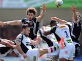 Danny Care of Harlequins puts in a box kick during the Aviva Premiership match between Exeter Chiefs and Harlequins at Sandy Park on May 4, 2014