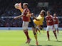 David Vaughan of Nottingham Forest tackled by Inigo Calderon of Brighton & Hove Albion during the Sky Bet Championship match on May 3, 2014