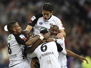Guingamp's Jonathan Martins Pereira celebrates with teammates after scoring against Rennes during the French Cup final on May 3, 2014