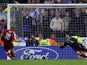 Liverpool's Dutch forward Dirk Kuyt scores the winning penalty past Chelsea's Czech goalkeeper Petr Cech to win the European Champions League semi final second leg football match at Anfield, Liverpool, north west England, 01 May 2007