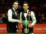 Mark Selby and Ronnie O'Sullivan shake hands ahead of The Dafabet World Snooker Championship final at Crucible Theatre on May 4, 2014