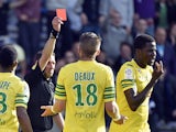 Nantes' Senegalese defender Papy Mison Djilibodji is sent off by the referee after an altercation during the French L1 football match Toulouse against Nantes on May 04, 2014