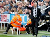Newcastle United manager, Alan Pardew makes arare appearance out out of the dug-out during the Barclays Premier League match between Newcastle United and Cardiff City at St. James' Park on May 03, 2014