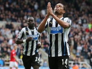 Newcastle United's French striker Loic Remy celebrates scoring his team's second goal during the English Premier League football match between Newcastle United and Cardiff City at St James' Park in Newcastle-upon-Tyne, northeast England, on May 3, 2014
