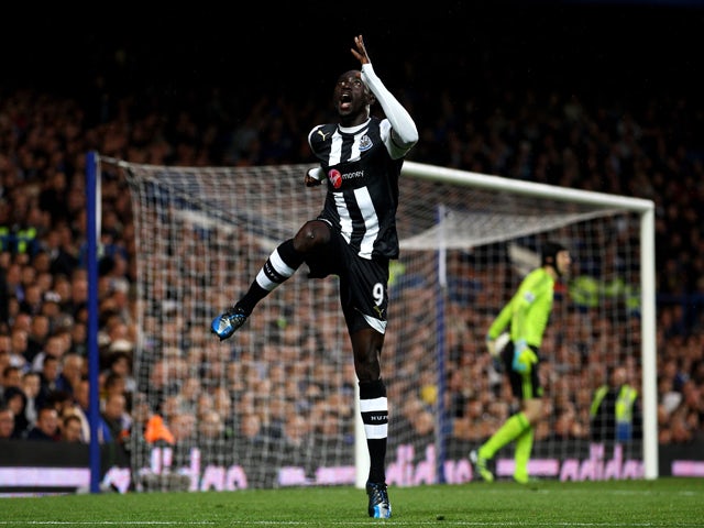 Papiss Cisse of Newcastle celebrates after scoring the opening goal during the Barclays Premier League match between Chelsea and Newcastle United at Stamford Bridge on May 2, 2012