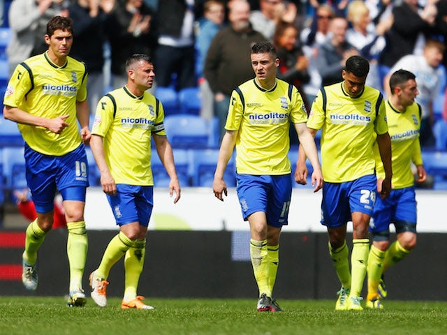 Nikola Zigic, Paul Robinson, Callum Reilly and Tom Adeyemi of Birmingham City look dejected after a goal from Bolton Wanderers on May 3, 2014