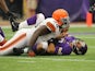 Christian Ponder #7 of the Minnesota Vikings reacts to a tackle by Phillip Taylor #98 of the Cleveland Browns on September 22, 2013