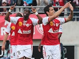 Reims' Congolese midfielder Prince Oniangue celebrates after scoring a goal during the French L1 football match between Reims (SR) and Evian (ETGFC) on May 4, 2014